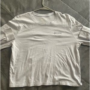 Light blue long sleeve shirt.